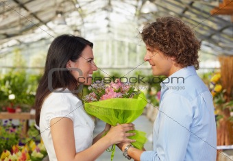 couple in flower nursery