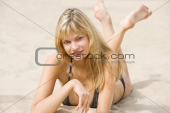 blond standing on beach