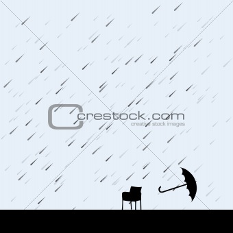 rain and umbrella over chair