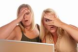 Two Shocked Women Using Laptop Isolated on a White Background.