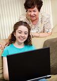 Mom and Daughter Using Computer
