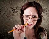 Nervous Woman Chewing on a Pencil