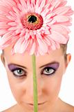 Closeup of flower above womans head