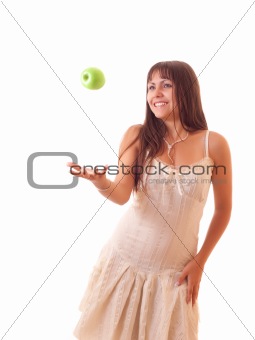 Young sexy woman juggle with apple isolated
