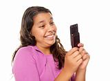 Happy Pretty Hispanic Girl On Cell Phone Isolated on a White Background.