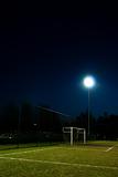 football field lit at night