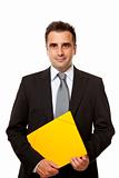 Businessman holds a yellow file 
