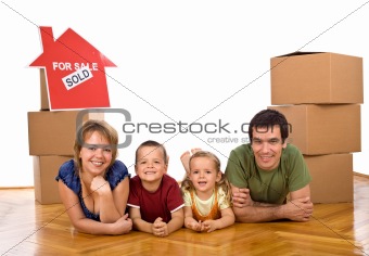 Happy family in their newly bought house