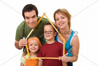 Happy family with their kids - real estate concept