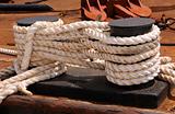 Old ropes tying ship