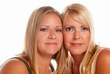Two Beautiful Sisters Portrait Isolated on a White Background.