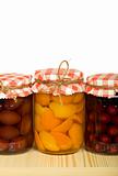 Canned fruits on the shelf - isolated