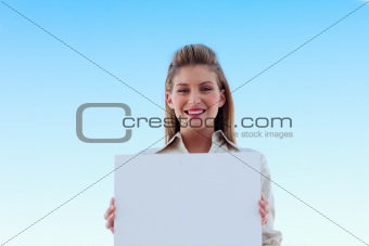 Businesswoman holding a white business card