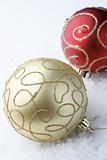 Red and gold Christmas bauble decorations.