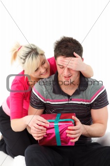 Girl giving her boyfriend a present