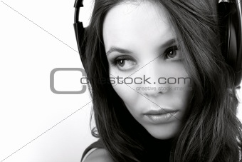 Young woman in earphones closely