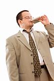 Businessman drinking from a flask