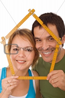 Couple with model house