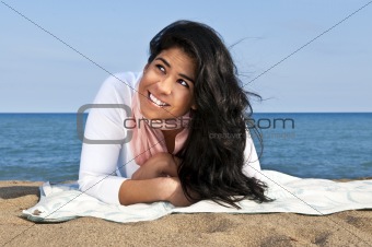 Young native american woman at beach