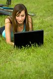 Woman with laptop outdoor