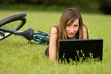 Woman with laptop outdoor