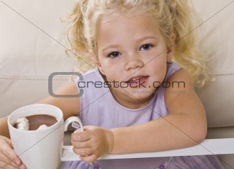 Girl Drinking Hot Chocolate out of Mug