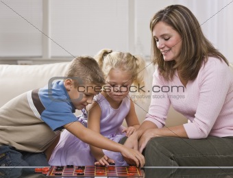 Woman Playing with Children