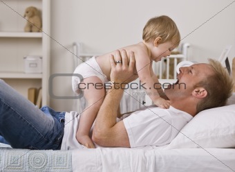 Father Holding Daughter