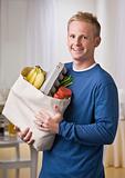 Man Holding Groceries