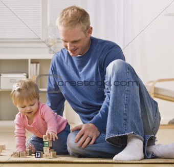 Man Playing with Daughter