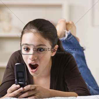Girl Looking at Cell Phone