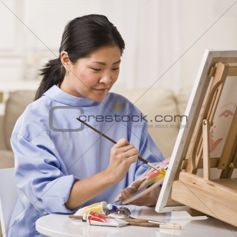 Woman Painting Picture