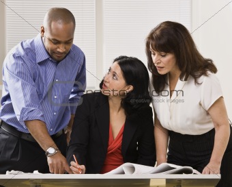 Women and Man Working in Office