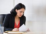 Woman Working on Paperwork