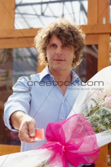 man buying flowers