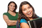 Proud Hispanic Mother and Daughter Ready for School Isolated on a White Background.