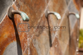 Beautiful Stone Wall Water Fountain Row Abstract.