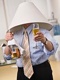 Male with Champagne Wearing a Lampshade