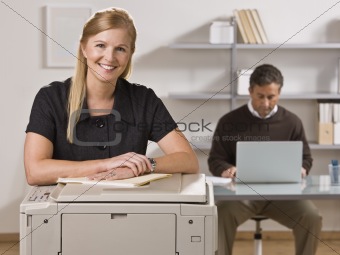 Man and Woman Working in Office