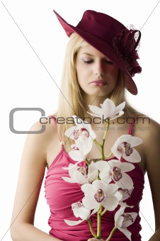 girl with orchid making face
