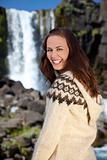 Beautiful Scandinavian Woman By A Waterfall