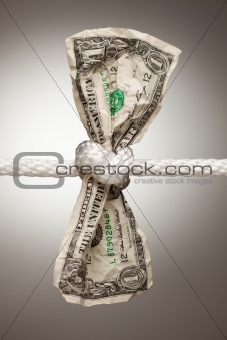 Wrinkled American Dollar Tied Up in Rope.