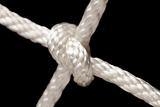 Nylon Rope Knot on a Black Background.