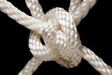 Nylon Rope Knot on a Black Background.