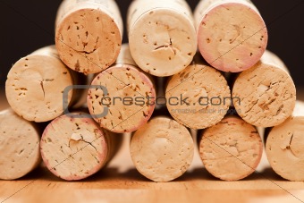 Stack of Wine Corks on a Wood Surface.