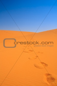 walking on sand dunes