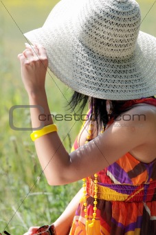 Young happy woman in grain field