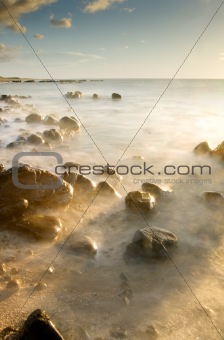 sunset of coral reef coastline