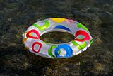 Inflatable ring floating on the sea