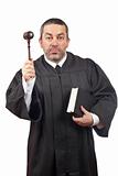 Judge holding the gavel and book